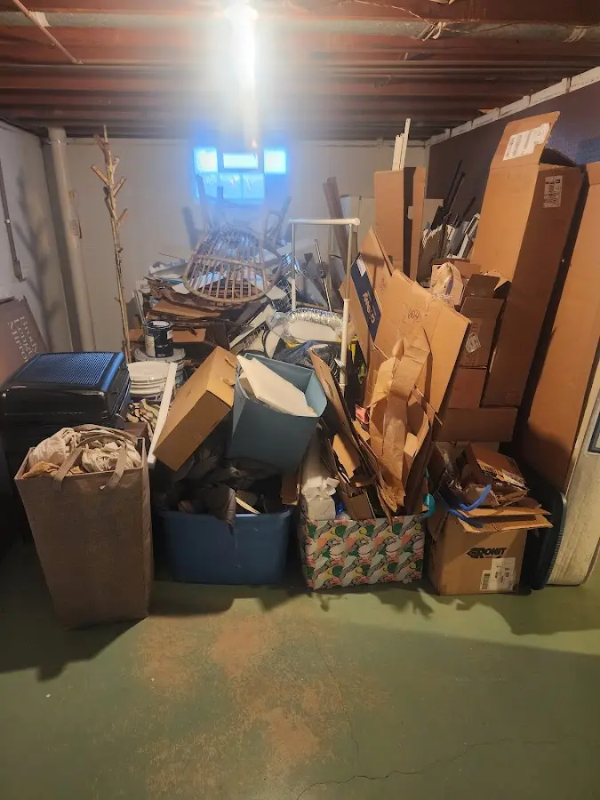 Roll-off dumpster container at job site for Construction Dumpster Rental in Highland